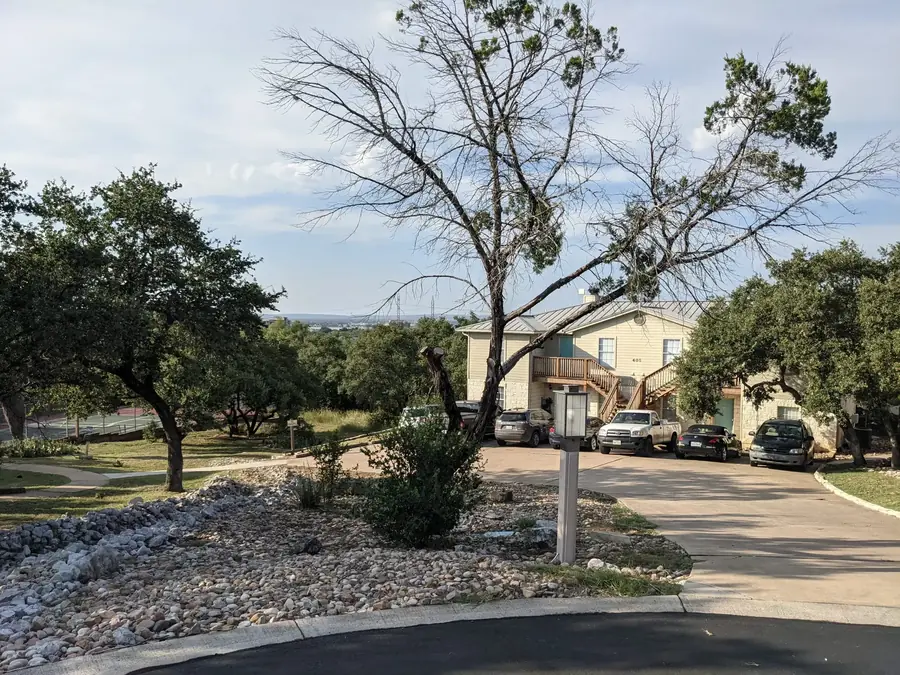 Street view of Baycliff Apartments building and entrance