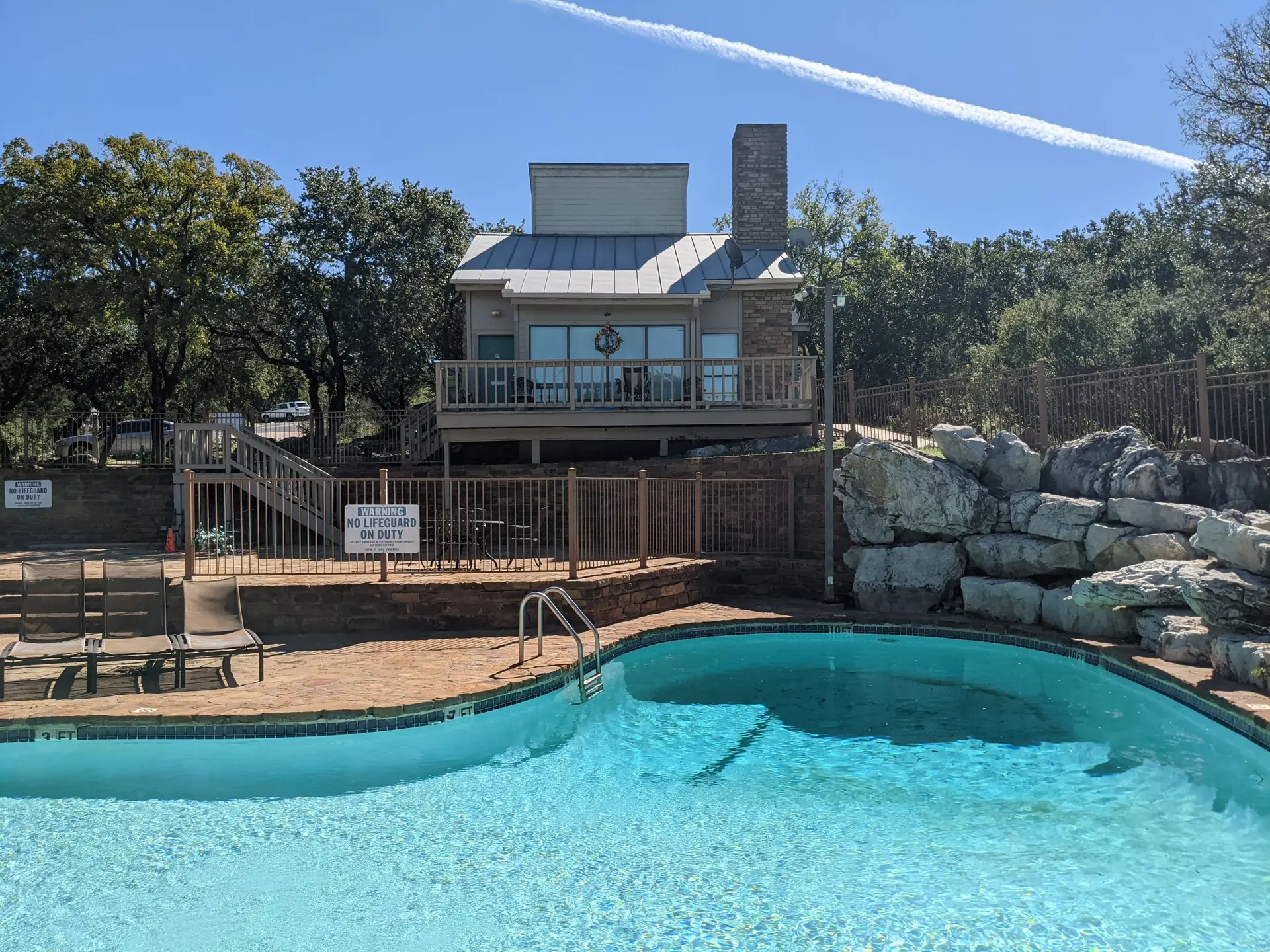 Baycliff Apartments entrance with Hill Country views