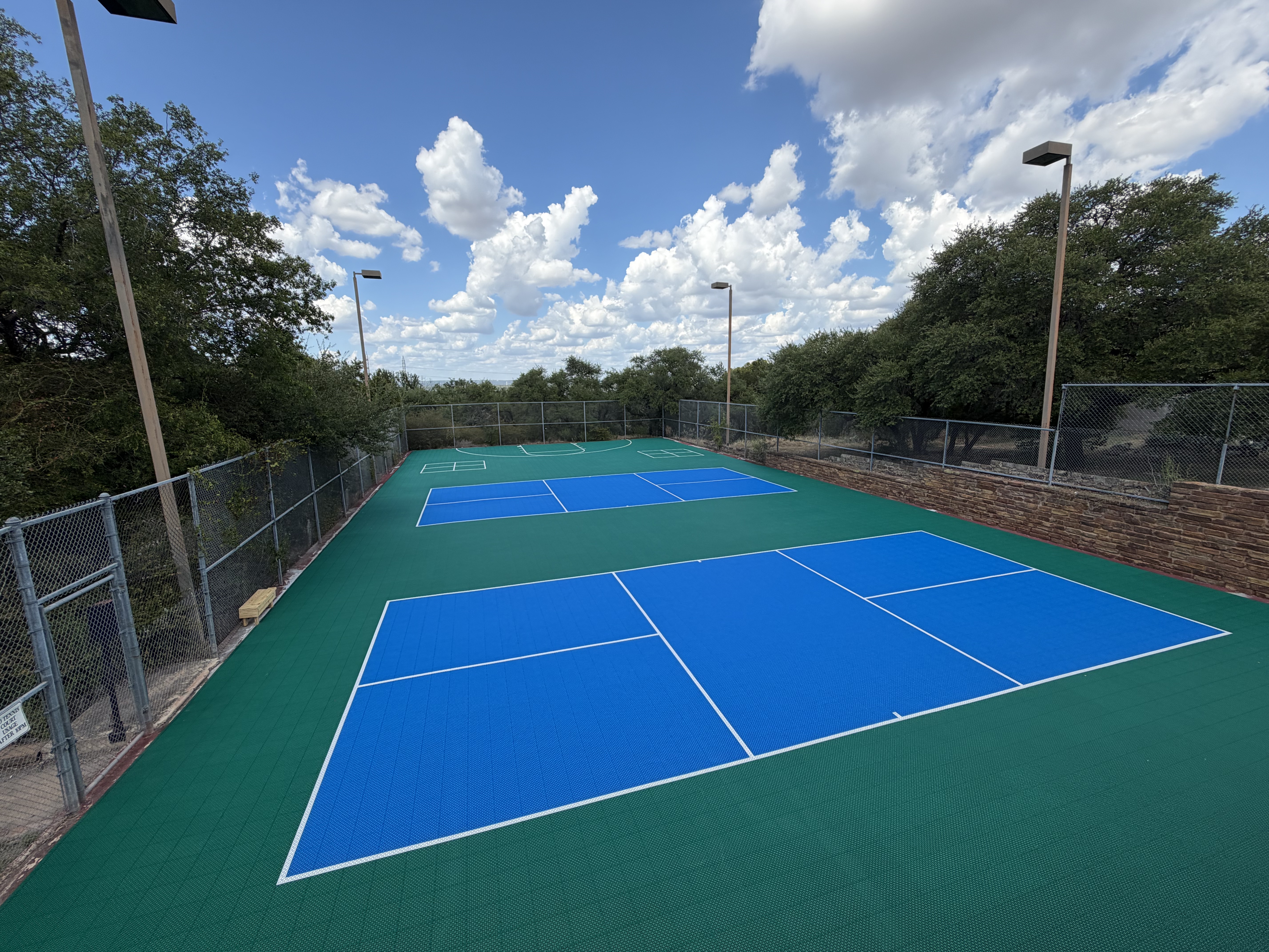 New lighted pickleball courts and basketball court at Baycliff Apartments, Horseshoe Bay TX — Hill Country views